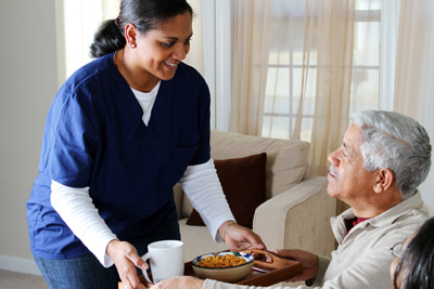 Caregiver serving food